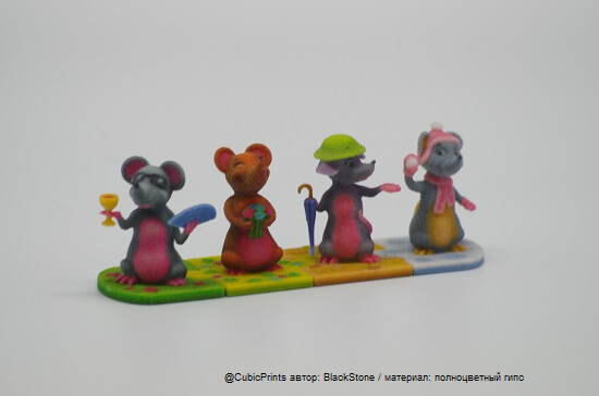 Фигурка робота, напечатанная на профессиональном 3D принтере из полноцветного гипса Пример цветной 3D-печати из гипса